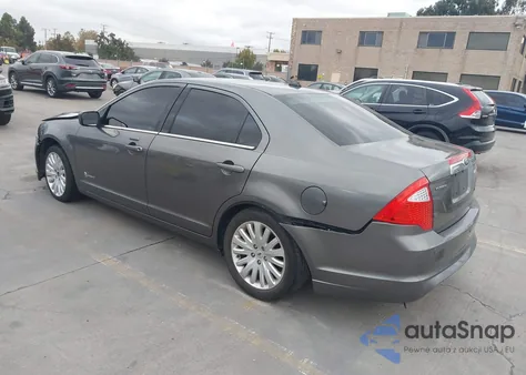 2012 Ford Fusion Hybrid z USA, uszkodzony, nr VIN 3FADP0L39CR181824